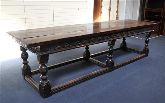 A 17th century style oak refectory table, 9ft 10in. x 2ft 9in. H.2ft 6in.